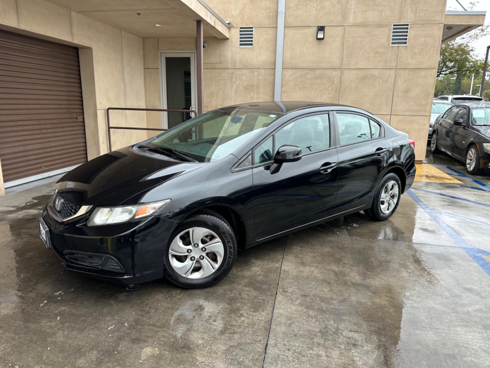 2013 Black /Grey Honda Civic LX Sedan 5-Speed AT (19XFB2F53DE) with an 1.8L L4 SOHC 16V engine, 5-Speed Automatic transmission, located at 30 S. Berkeley Avenue, Pasadena, CA, 91107, (626) 248-7567, 34.145447, -118.109398 - New Paint! Gas Saver! Discover Reliable and Efficient Driving: 2013 Honda Civic LX Now at Our Pasadena, CA Dealership Step into the world of efficiency and reliability with the 2013 Honda Civic LX, a standout choice now featured at our BHPH dealership in Pasadena, CA. Known for its dependable per - Photo #0